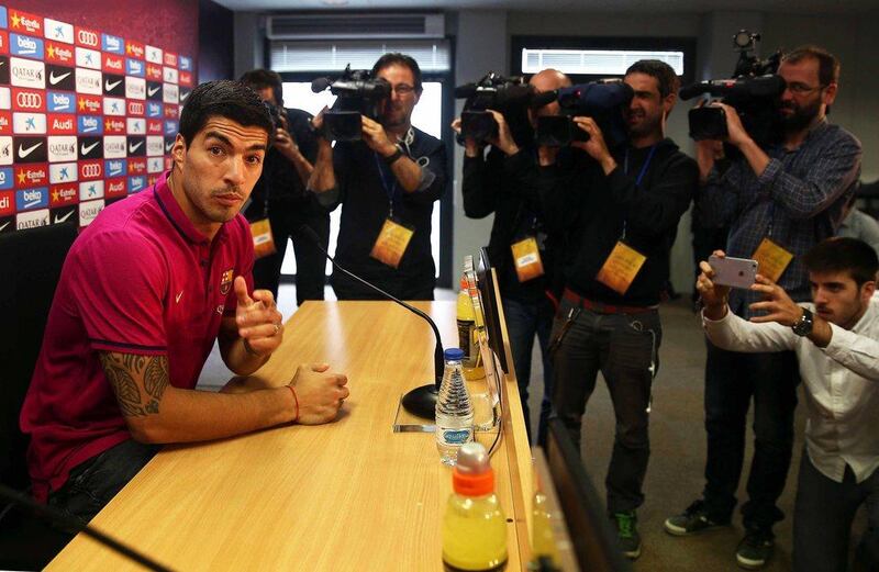 FC Barcelona’s Uruguayan striker Luis Suarez (L) attends a press conference at Sant Joan Despi sports complex in Barcelona, northeastern Spain, 12 May 2016. FC Barcelona will face Granada CF in La Liga on 14 May 2016. EPA/TONI ALBIR