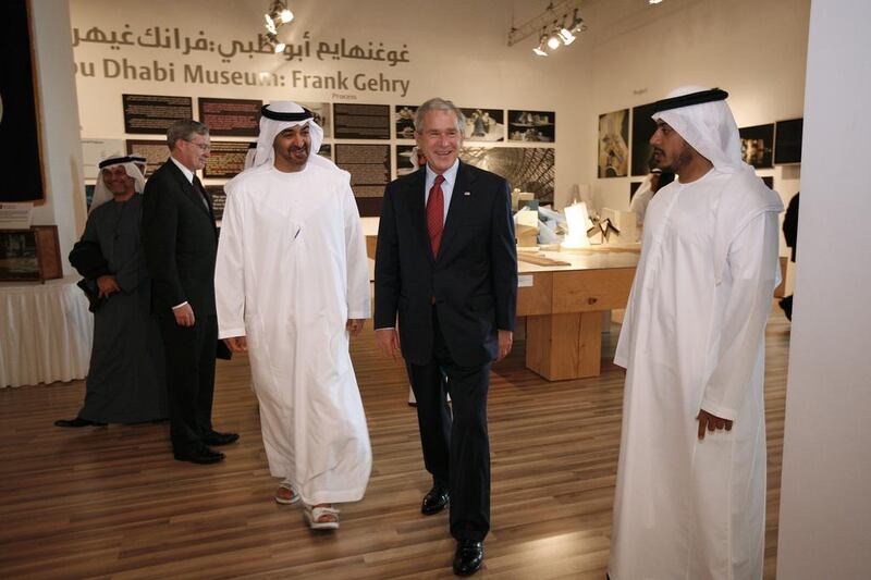 US President George W Bush attends a walk around presentation on Saadiyat Island Cultural District Exhibition led by Sheikh Mohammed bin Zayed, left, and Sheikh Sultan bin Tahnoun, Head of Abu Dhabi Tourism Authority. Philip Cheung / Abu Dhabi Media Company / January 14, 2008