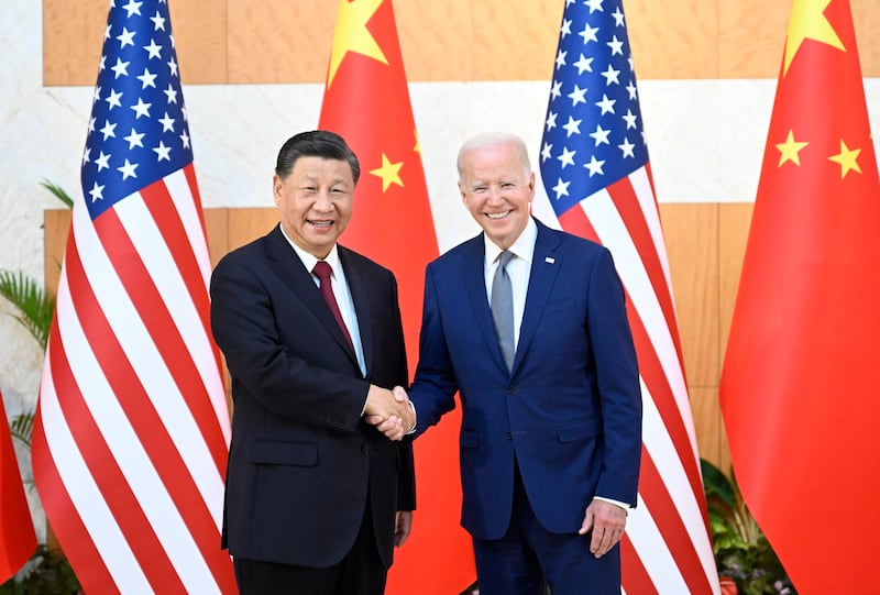 The Chinese president greets his US counterpart Joe Biden. EPA