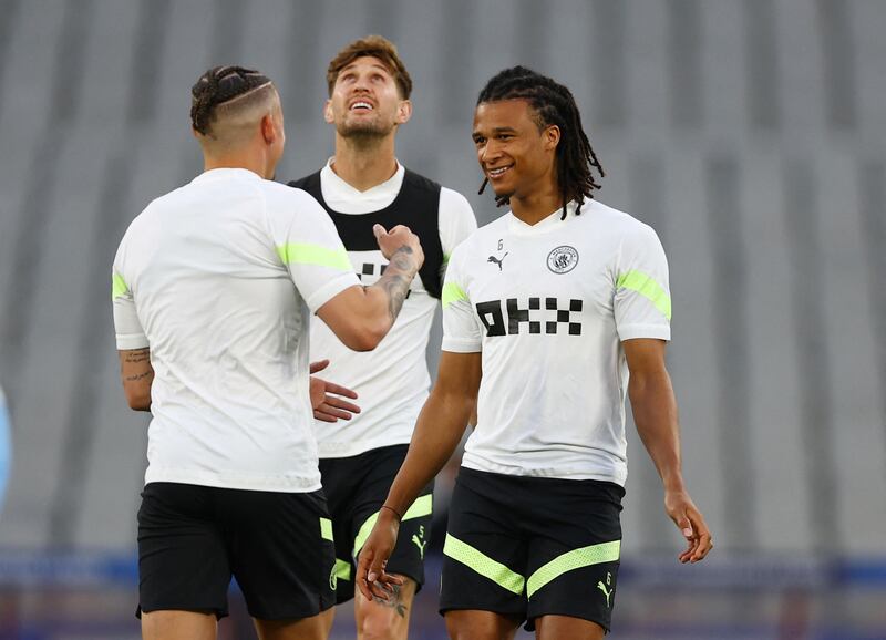 Manchester City's Nathan Ake with teammates during training. Reuters