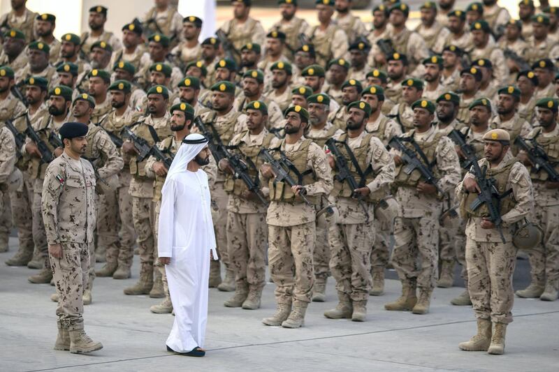 SWEIHAN, ABU DHABI, UNITED ARAB EMIRATES - February 09, 2020: HH Sheikh Mohamed bin Rashid Al Maktoum, Vice-President, Prime Minister of the UAE, Ruler of Dubai and Minister of Defence (2nd L), inspects military personnel during a reception to celebrate and honor members of the UAE Armed Forces who participated in the Arab coalition in Yemen, at Zayed Military City.

( Abdullah Al Junaibi for the Ministry of Presidential Affairs )
---