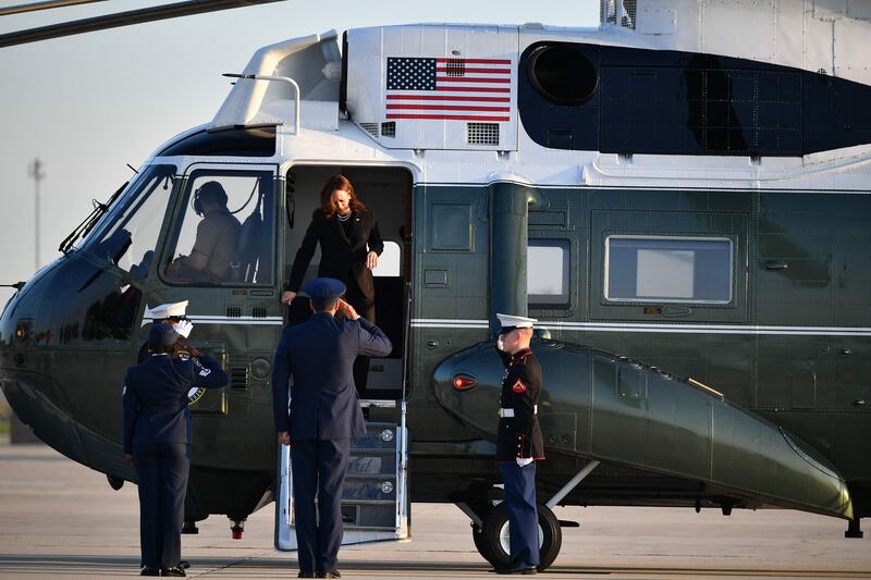 US Vice President Kamala Harris and her husband Doug Emhoff make their way to board a flight before departing from Andrews Air Force Base in Maryland.  - Vice President Harris is heading to Shanksville, Pennsylvania to attend a 9/11 commemoration.  AFP