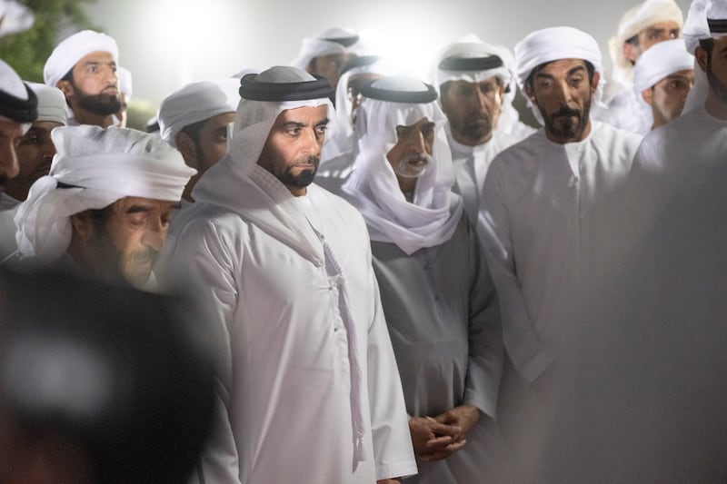 Sheikh Saif and Sheikh Nahyan bin Mubarak, Minister of Tolerance and Coexistence, attend the burial of Hamad bin Suhail Al Khaili. Mohamed Al Hammadi / UAE Presidential Court