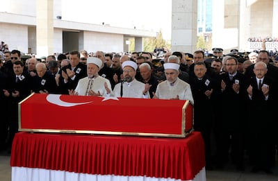 Family members and political leaders attend funeral prayers for Halil Cankaya, 24, one of 36 Turkish soldiers killed on Thursday in a Syrian army attack in the Idlib area of Syria, in Ankara, Turkey, Sunday, March 1, 2020. (AP Photo/Burhan Ozbilici)