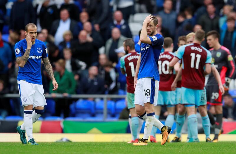 Soccer Football - Premier League - Everton vs Burnley - Goodison Park, Liverpool, Britain - October 1, 2017   Everton's Sandro Ramirez and Gylfi Sigurdsson look dejected after the match    Action Images via Reuters/Jason Cairnduff  EDITORIAL USE ONLY. No use with unauthorized audio, video, data, fixture lists, club/league logos or "live" services. Online in-match use limited to 75 images, no video emulation. No use in betting, games or single club/league/player publications. Please contact your account representative for further details.