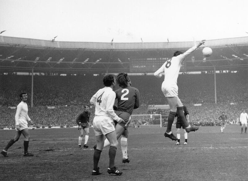 11th April 1970:  A Leeds United defender jumps for the ball during the FA Cup final between Chelsea and Leeds United at Wembley.  (Photo by Evening Standard/Getty Images)