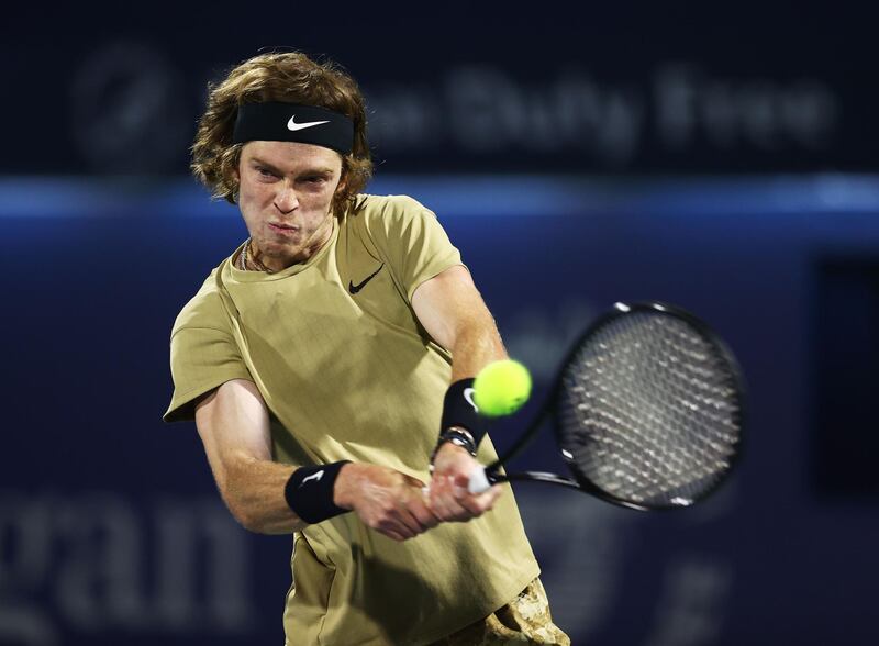 DUBAI, UNITED ARAB EMIRATES - MARCH 17: Andrey Rublev of Russia hits a backhand during the round of 16 match between Taylor Fritz of the USA and Andrey Rublev of Russia during Day Eleven of the Dubai Duty Free Tennis at Dubai Duty Free Tennis Stadium on March 17, 2021 in Dubai, United Arab Emirates. (Photo by Francois Nel/Getty Images)