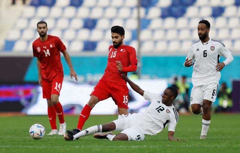 Soccer Football- Arabian Gulf Cup25 - Group B - Bahrain v United Arab Emirates - Al-Minaa Olympic Stadium, Basra, Iraq - January 7, 2023 Bahrain's Al Jassim Shaikh in action with United Arab Emirates' Khalifa Al Hammadi REUTERS / Thaier Al-Sudani