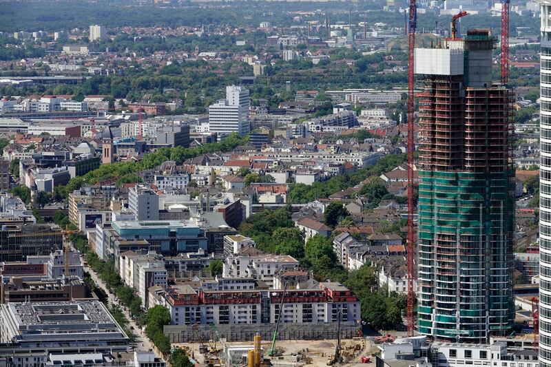 Mandatory Credit: Photo by Mauritz Antin/EPA-EFE/Shutterstock (9764993d)
A general view of the residential area of Gallus in Frankfurt, Germany, 18 July 2018, with the construction site of Grand Tower (R), Germany's tallest apartment high-rise. German media reports on 18 July 2018 state a survey by German property portal immowelt showed property prices in Frankfurt continuing to rise, with price paid per square meter topping 4410 euro in 2018, an increase of 98 per cent compared with 2230 euro paid per square meter in 2008. At top of the list of property prices is Munich, where price per square meter has reached 7070 euro, an increase of 141 per cent when compared with prices in 2008.
Property prices keep rising in Frankfurt, Frankfurt Am Main, Germany - 18 Jul 2018