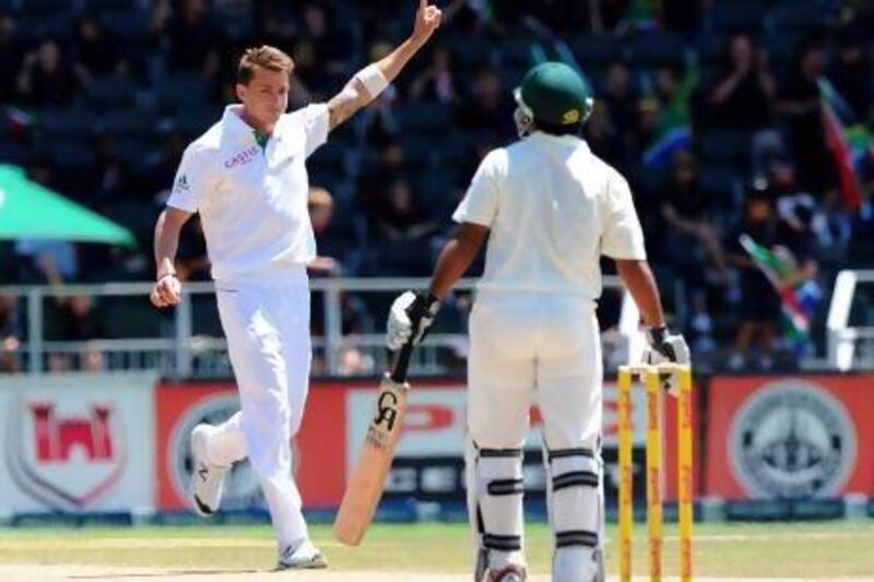 South African fast bowler Dale Steyn, left, celebrates the wicket of Shafiq Asad, right, on day four of the first test match between South Africa and Pakistan last week at Wanderers Stadium in Johannesburg. AFP Photo