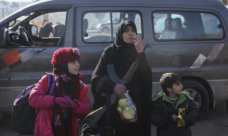 Syrians evacuated from Aleppo arrive at a refugee camp in Rashidin, near Idlib, on December 20, 2016. AP Photo