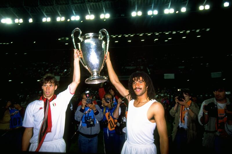 Van Basten and Gullit celebrate with the trophy after winning the European Cup final against Steaua Bucharest in 1989, at Camp Nou in Barcelona