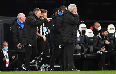 NEWCASTLE UPON TYNE, ENGLAND - FEBRUARY 27: Newcastle substitute Matt Ritchie is given instructions before coming on from coach Graeme Jones as manager Steve Bruce (r) looks on during the Premier League match between Newcastle United and Wolverhampton Wanderers at St. James Park on February 27, 2021 in Newcastle upon Tyne, England. Sporting stadiums around the UK remain under strict restrictions due to the Coronavirus Pandemic as Government social distancing laws prohibit fans inside venues resulting in games being played behind closed doors. (Photo by Stu Forster/Getty Images)