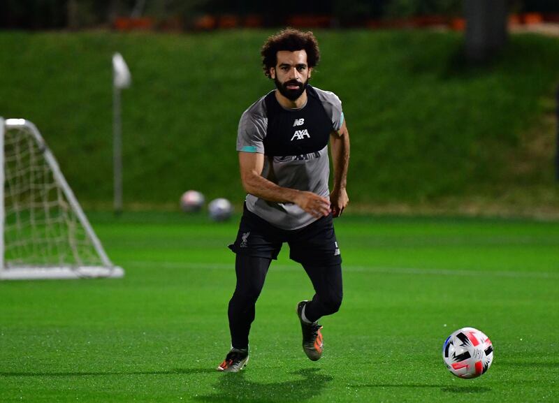 Liverpool's Egyptian midfielder Mohamed Salah takes part in a team training session at Qatar University stadium in the capital Doha on December 16, 2019, ahead of the December 18 FIFA Club World Cup football match against Mexico's Monterrey. / AFP / Giuseppe CACACE
