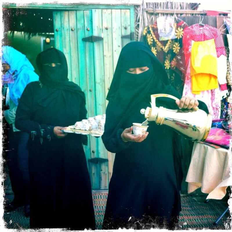 Day trip with friends to the Western Region and the Mazayin Dhafra Camel Festival, 220 kms west of Abu Dhabi on December 20, 2013.Warm greetings and traditional coffee were on hand as well.  Picture taken with the Hipstamatic app for the iPhone. Liz Claus / The National

