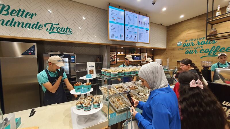 The warm lighting and the smell of cinnamon, butter and coffee create an irresistible ambiance inside Cinnabon