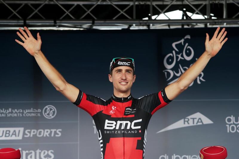 Taylor Phinny of team BMC celebrates winning the first stage individual time trial of the Dubai Tour cycling race at the World Trade Center in Dubai on Wednesday. Christopher Pike / The National