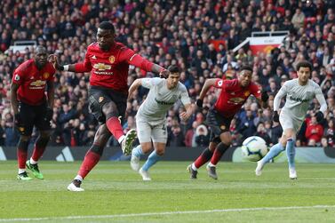 Paul Pogba converts his second penalty as Manchester United claimed a 2-1 win against West Ham at Old Trafford. EPA