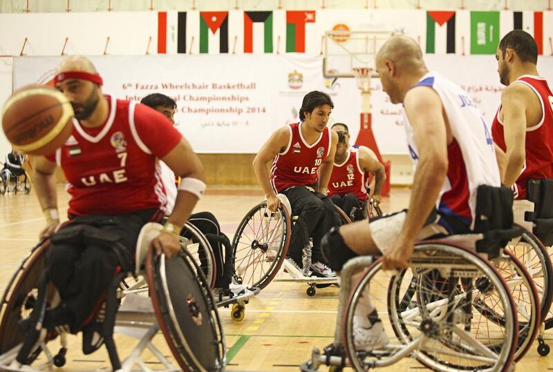 The UAE's men's wheelchair basketball team in action against Jordan at Al Ahli Sports Club in Dubai. Lee Hoagland / The National