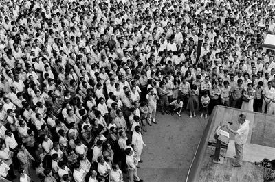 Lee Kuan Yew speaking to a packed lunchtime rally crowd at Fullerton Square in Singapore on December 20, 1976. Jerry Seh / New Nation / AFP