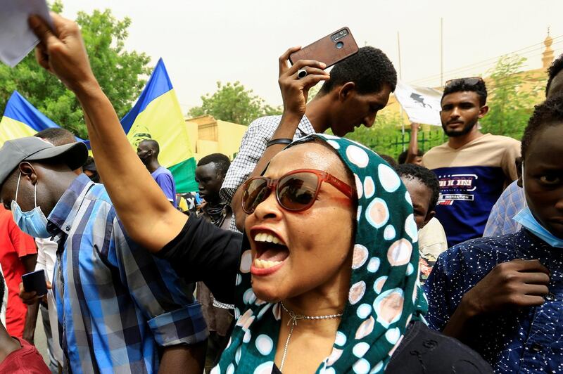 Sudanese take part in a march against the Rapid Support Forces, who they blame for a raid on protesters who had camped outside the defense ministry during the 2019 revolution, in Khartoum, Sudan, June 3, 2021. REUTERS/Mohamed Nureldin Abdallah