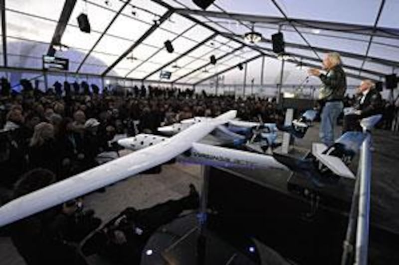 Richard Branson speaks at a news conference before Virgin Galactic's unveiling of its new commercial spaceship SpaceShipTwo in Mojave, California, last December.