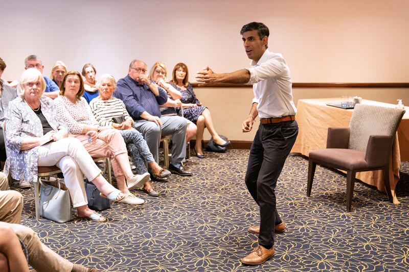 Mr Sunak delivers a speech during a campaign event in Newmarket. AFP