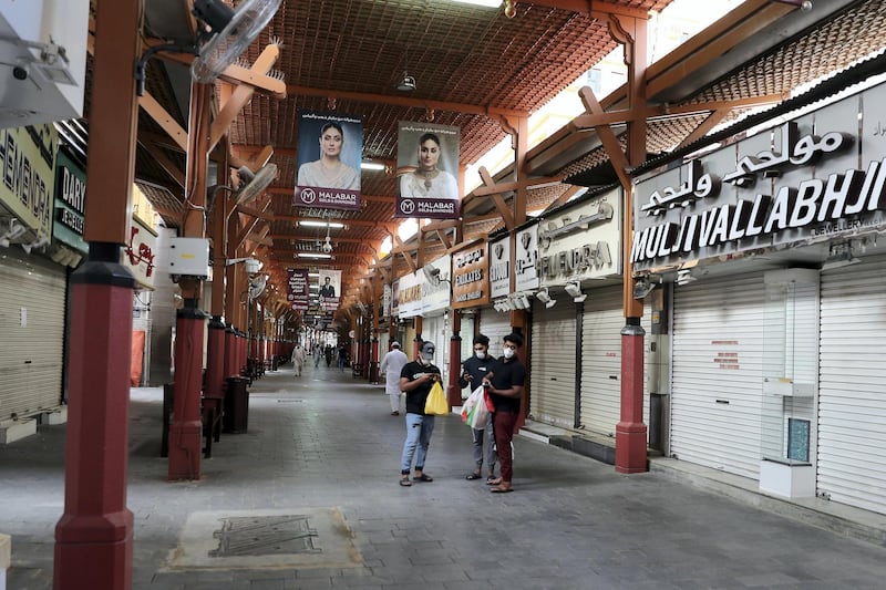 DUBAI , UNITED ARAB EMIRATES , Mar 24 – 2020 :- View of the closed Dubai Gold Souk in Deira Dubai. ( Pawan Singh / The National ) For News/Online. Then and Now series