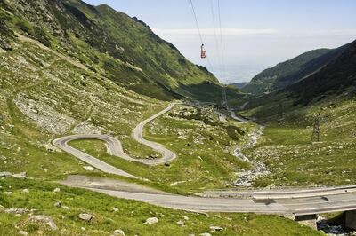 View on parts of the Transfagarasan mountain highway in Romania, with cable car.