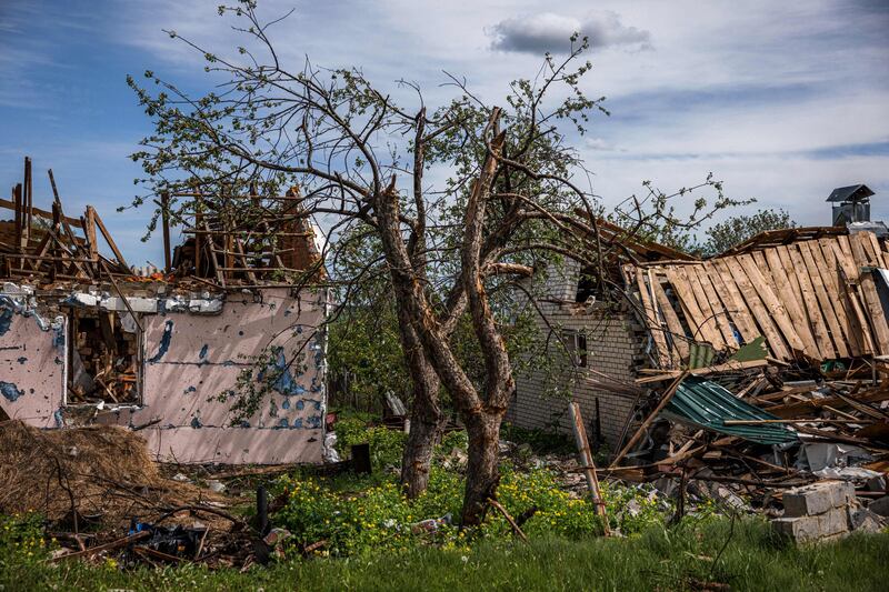 Destroyed houses at Vilkhivka, near eastern city Kharkiv. Fighting has slowed to village-by-village battle, say western officials. AFP