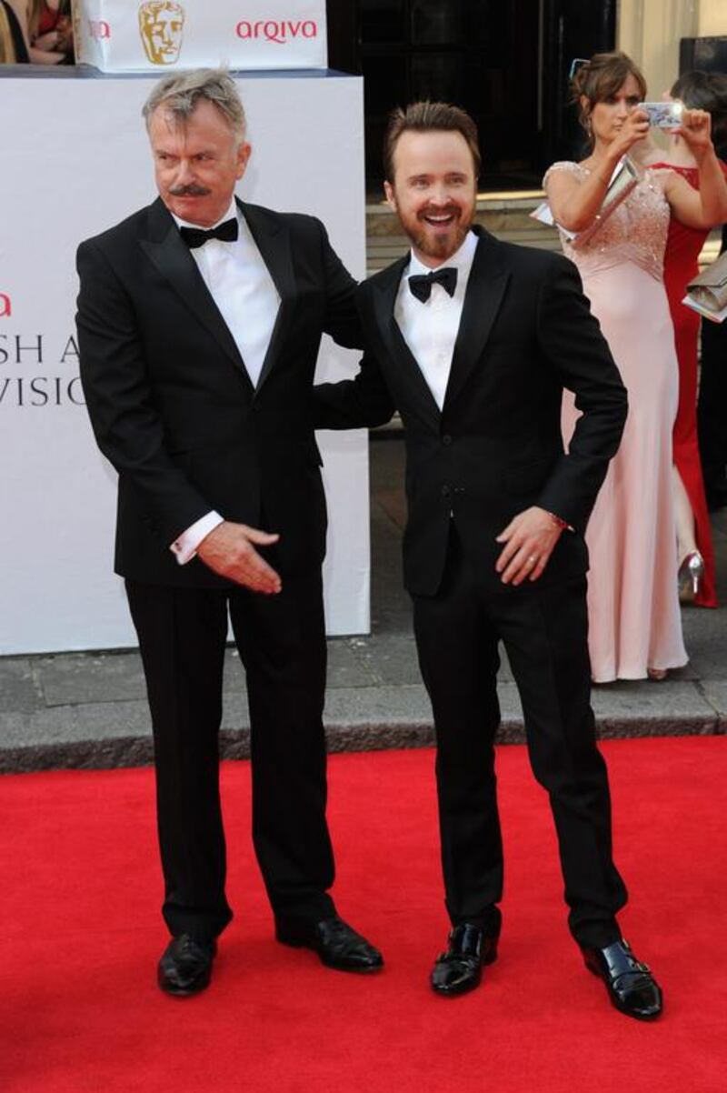 Aaron Paul and Sam Neill. Stuart C. Wilson / Getty Images