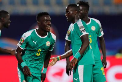 Soccer Football - Africa Cup of Nations 2019 - Quarter Final - Senegal v Benin - 30 June Stadium, Cairo, Egypt - July 10, 2019  Senegal's Idrissa Gueye celebrates scoring their first goal with team mates           REUTERS/Mohamed Abd El Ghany