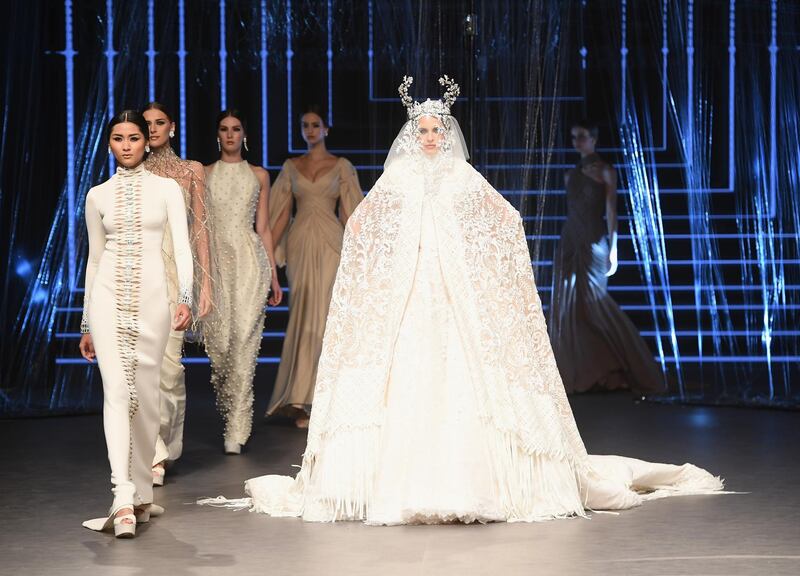 DUBAI, UNITED ARAB EMIRATES - OCTOBER 21:  Models walk the runway at the Ezra show during Fashion Forward Spring/Summer 2017 at the Dubai Design District on October 21, 2016 in Dubai, United Arab Emirates.  (Photo by Stuart C. Wilson/Getty Images) *** Local Caption ***  al25oc-pg4-FFWD9.jpg