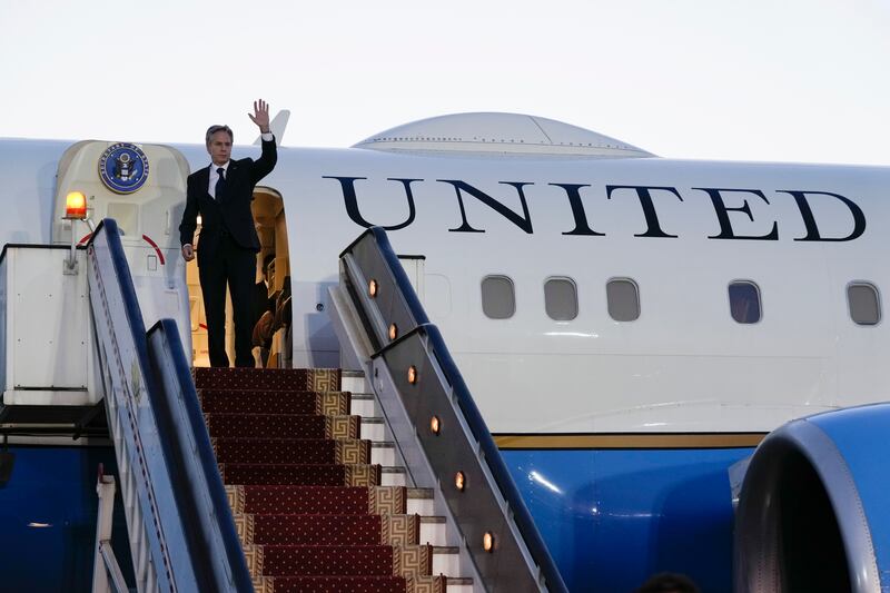 US Secretary of State Antony Blinken waves before boarding his plane as he leaves Cairo. AP
