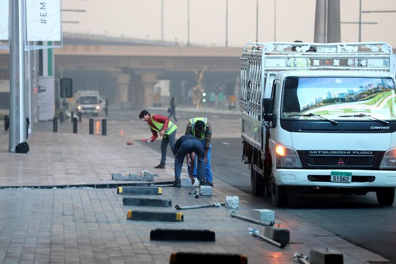 Dubai, United Arab Emirates - January 01, 2011: The clean up operations after the celebrations the night for New Years Eve 2019. Tuesday, December 1st, 2019 in Downtown, Dubai. Chris Whiteoak/The National