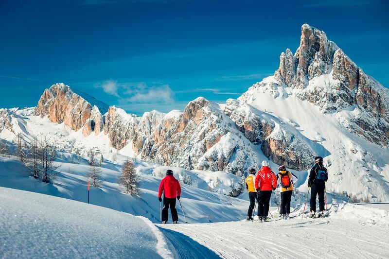 A group skis at the Tofana ski area of Cortina d'Ampezzo in the Italian Dolomites. www.bandion.it