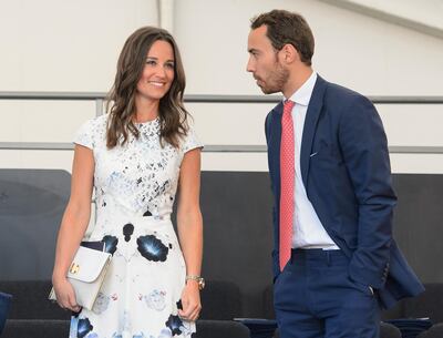 LONDON, UNITED KINGDOM - JULY 11: Pippa Middleton and James Middleton in the royal box during the Coronation Festival Evening Gala at Buckingham Palace on July 11, 2013 in London, England. (Photo by Dominic Lipinski-WPA Pool/Getty Images) *** Local Caption ***  AL29JL-CROWNS-PIPPA.jpg