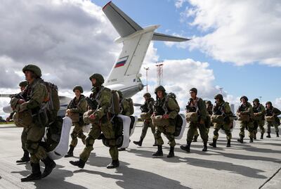Russian paratroopers board transport planes during military exercises at an aerodrome in the Kaliningrad region, Russia, in September 2021. Reuters