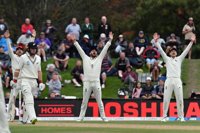 CHRISTCHURCH, NEW ZEALAND - APRIL 02: James Vince of England (C) and Joe Root of England (R) unsuccessfully appeal for the wicket of Tom Latham of New Zealand during day four of the Second Test match between New Zealand and England at Hagley Oval on April 2, 2018 in Christchurch, New Zealand.  (Photo by Kai Schwoerer/Getty Images)