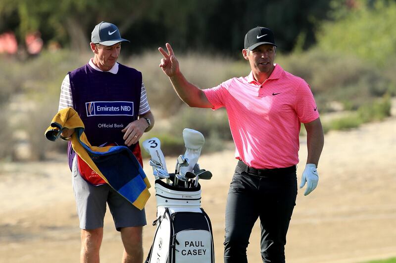 Paul Casey and his caddie after he chipped in for a birdie on the 17th. Getty