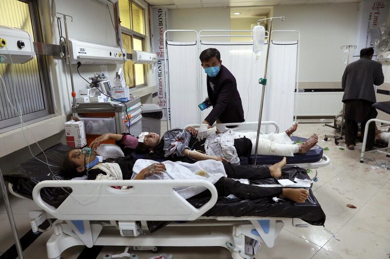 Afghan school students are treated in a hospital after bombings at their school in Kabul on May 8, 2021. AP Photo