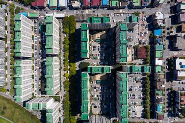 Aerial photograph of apartments above Jeonju, South Korea. South Korean airlines have pulled flights to Japan due to lack of demand as relations between the two countries have soured in recent months. Bloomberg