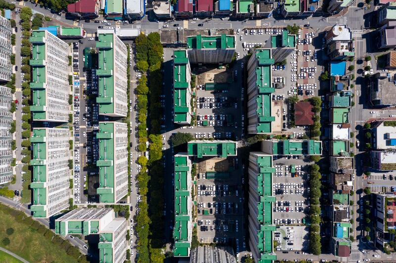 Residential apartment buildings stand in this aerial photograph taken above Jeonju, South Korea, on Friday, Sept. 13, 2019. Relations between Tokyo and Seoul have plumbed new depths over the past few months, as lingering resentment over Japan’s 1910-1945 colonization of the Korean Peninsula resurfaced. Disputes have damaged trade and tourism, as well as military ties between the two U.S. allies. Photographer: SeongJoon Cho/Bloomberg