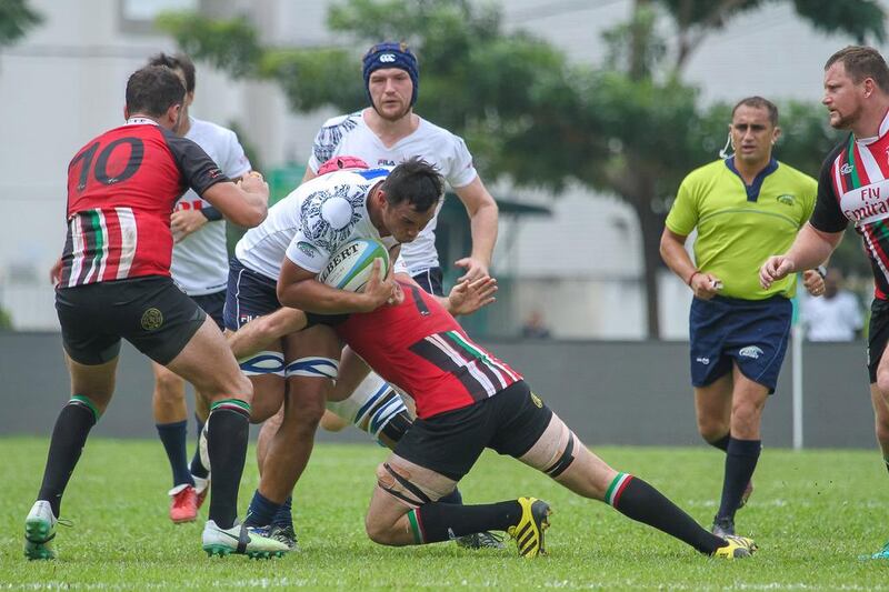 The UAE, in red and black, in action against the Philippines during their Asia Rugby Championship Division 1 clash on Saturday. Courtesy Asia Rugby / Tigers Super Sports Media