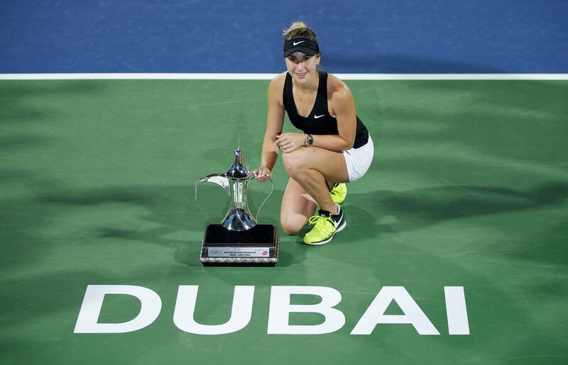 Belinda Bencic poses with her trophy after winning the Dubai Duty Free Tennis Championships. EPA