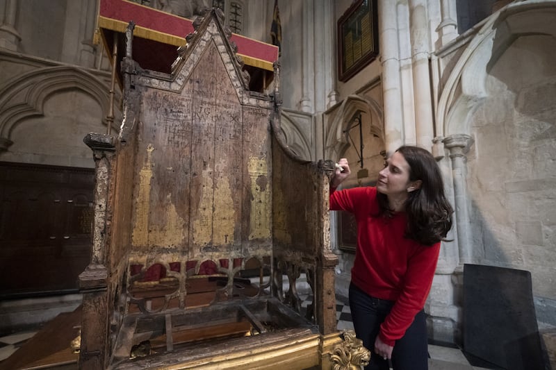 Conservator Krista Blessley works on the restoration of the Coronation Chair at Westminster Abbey in London, before the coronation of King Charles III. All photos: PA