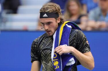 Greece's Stefanos Tsitsipas walks to the other side of the court during his 2021 US Open Tennis tournament men's singles third round match against Spain's Carlos Alcaraz at the USTA Billie Jean King National Tennis Center in New York, on September 3, 2021.  (Photo by Kena Betancur  /  AFP)