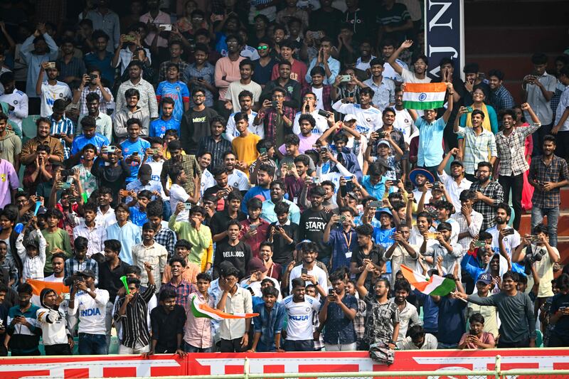 Fans in Visakhapatnam celebrate after India's Yashasvi Jaiswal reached his double century. AFP