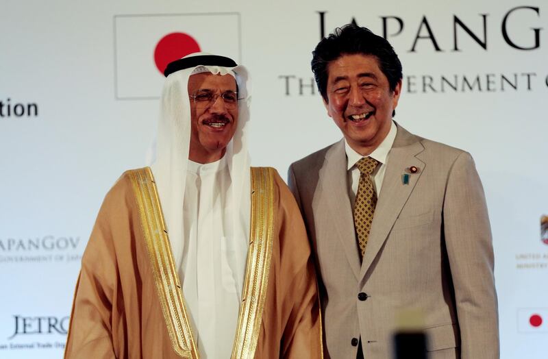 Japan's Prime Minister Shinzo Abe with Sultan Bin Saeed Al Mansoori,UAE's economy minister, during the Japan - UAE business forum in Abu Dhabi on April 30, 2018. Christopher Pike / Reuters