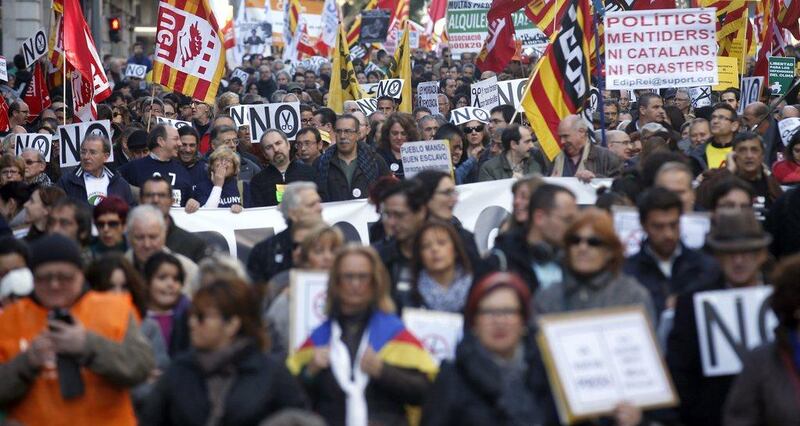 People take part in a protest against government austerity measures in central Barcelona. Albert Gea / Reuters